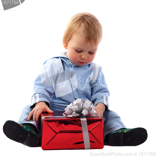Image of Little boy with a gift