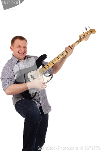 Image of Young man playing guitar