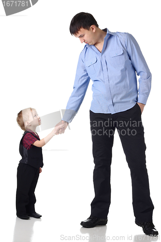 Image of Handshake of man and boy