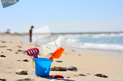 Image of Plastic bucket on the beach