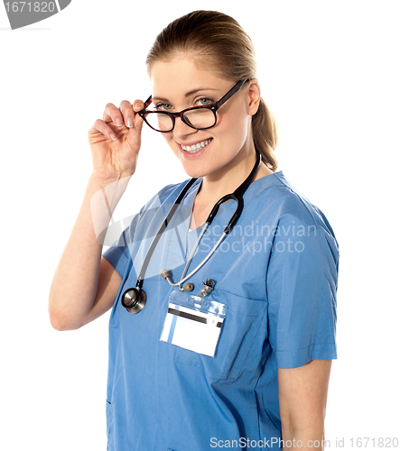 Image of Portrait of happy smiling young female doctor