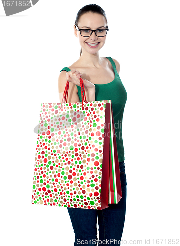 Image of Image of glamorous shopping girl holding bags