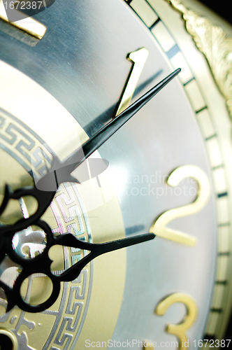 Image of Clock hands, shallow DOF