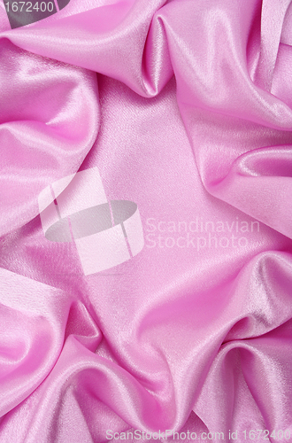 Image of Smooth elegant pink silk as background 