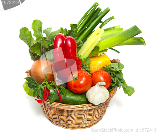 Image of Fresh vegetables in basket isolated on white