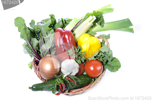 Image of Fresh vegetables in basket isolated on white 