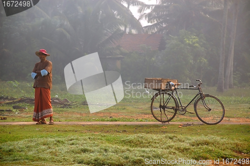 Image of Fish Dealer in the Fishiing Village