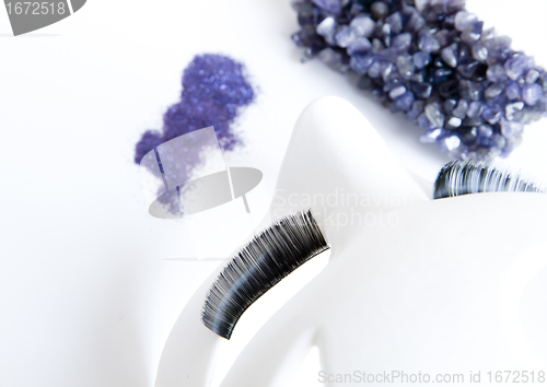 Image of false eyelashes and makeup acessories