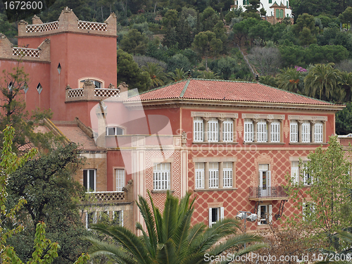 Image of Reddish building in Guell park, Barcelona , Spain