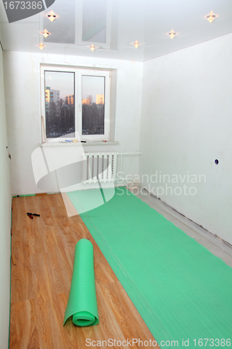 Image of repair in room - laying floorings