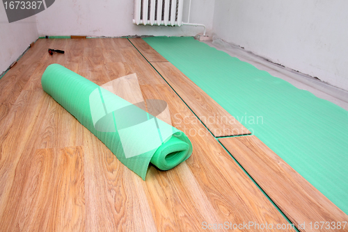 Image of repair in room - laying floorings