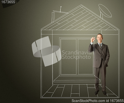 Image of asian businessman with marker in fictional house