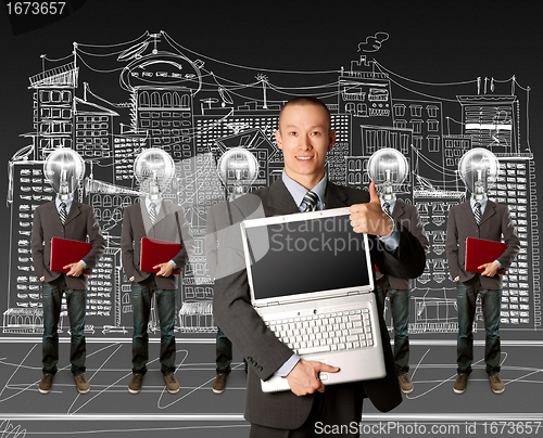 Image of lamp head businesspeople with laptop