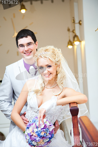 Image of Happy groom and bride