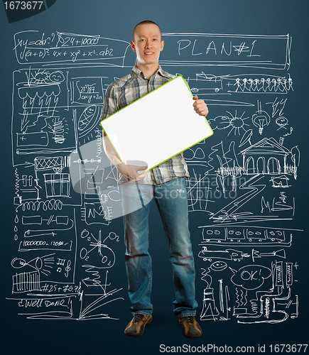 Image of asian male with write board in his hands