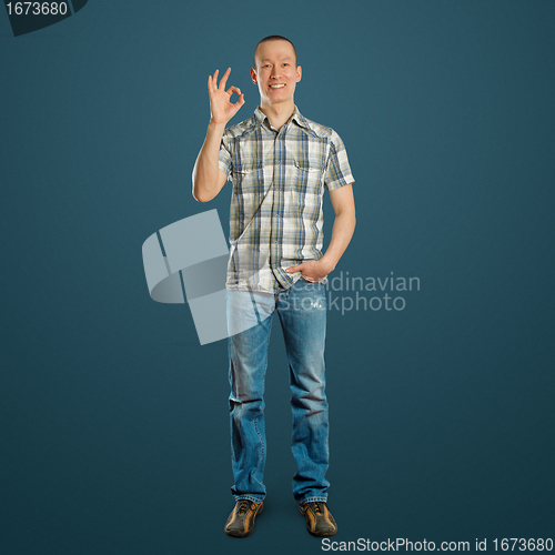 Image of asian man shows OK