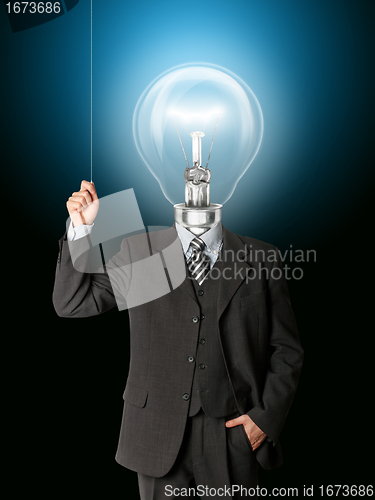 Image of business man turn on hith bulb head