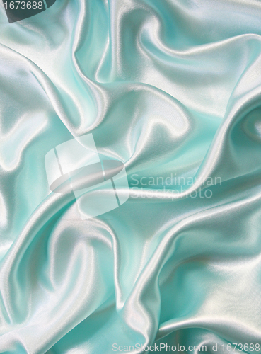 Image of Smooth elegant blue silk can use as background 