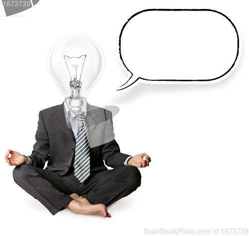 Image of businessman in lotus pose and lamp-head with thought bubble