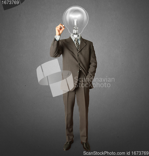 Image of businessman with lamp-head and marker