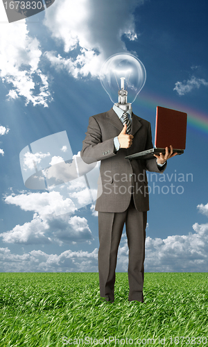 Image of businessman with lamp-head outdoors