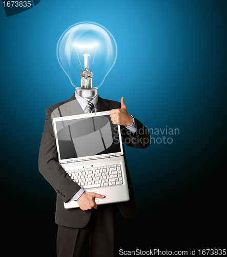 Image of businessman with lamp-head with open laptop shows welldone