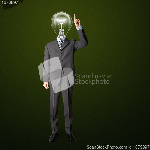 Image of full length businessman with lamp-head push the button