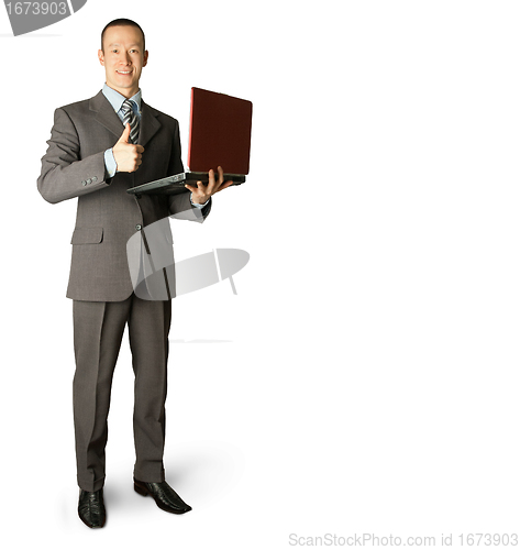 Image of Full length portrait of businessman with laptop