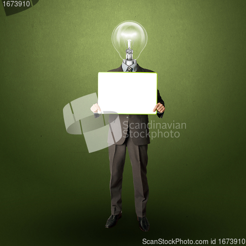 Image of happy businessman with lamp-head holding card
