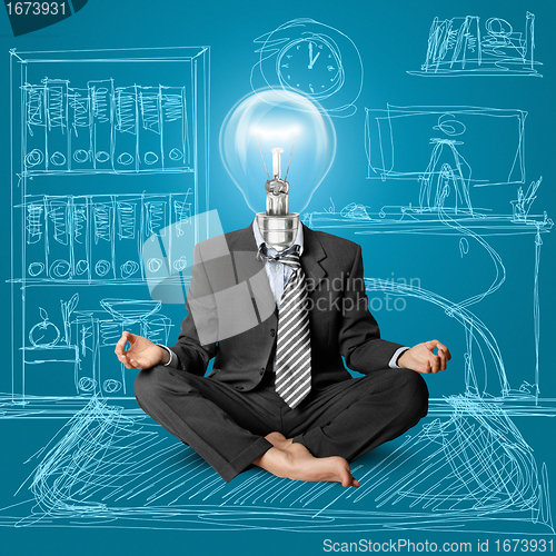 Image of lamp-head businessman in lotus pose