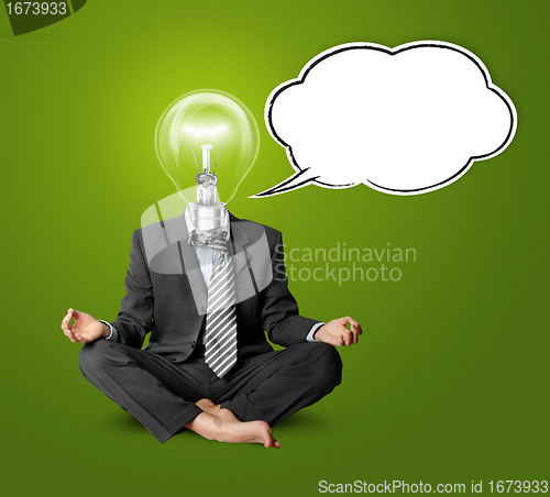 Image of lamp-head businessman in lotus pose with speech bubble