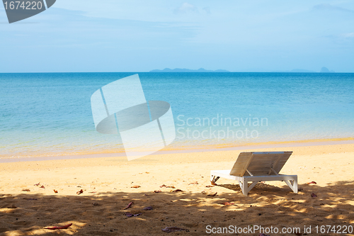 Image of Chaise lounge on a beach