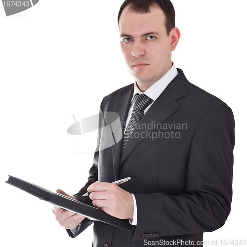 Image of businessman with pen and notepad