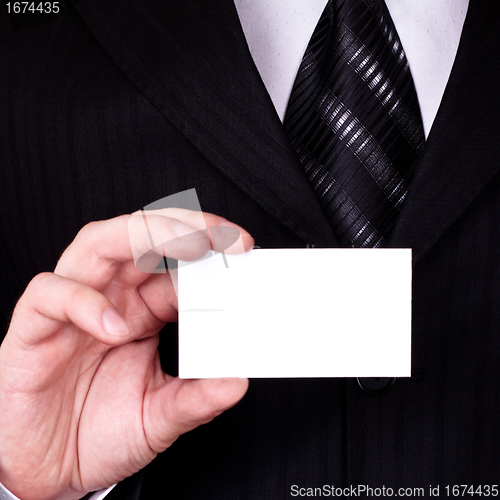 Image of businessman show blank card