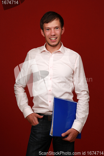 Image of Young student with textbook