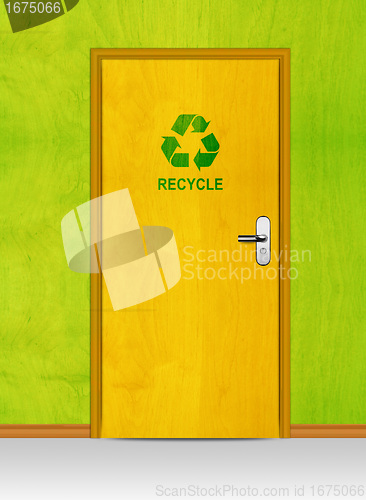 Image of wooden door with recycle sign