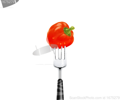 Image of Red pepper pierced by fork,  isolated on white background 