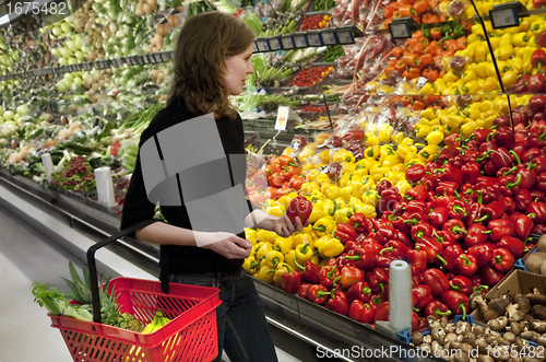 Image of Woman shopping at super market