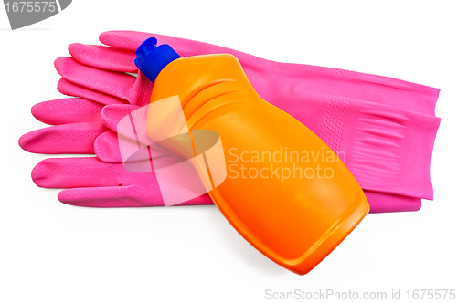 Image of Bottle of orange with pink rubber gloves