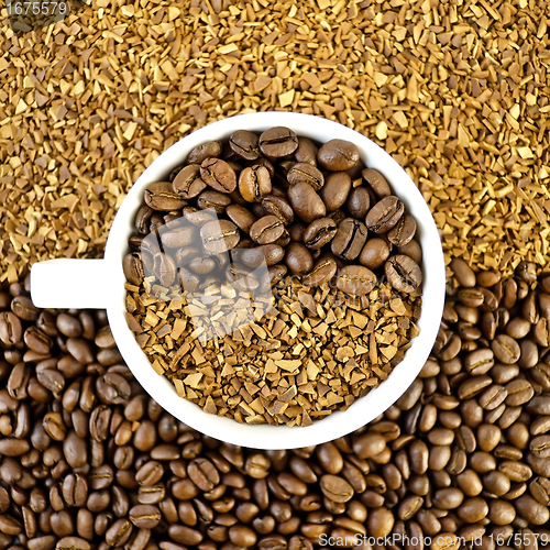 Image of Coffee beans and grains in a white cup