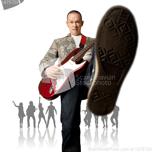 Image of punk man with the guitar and silhouette
