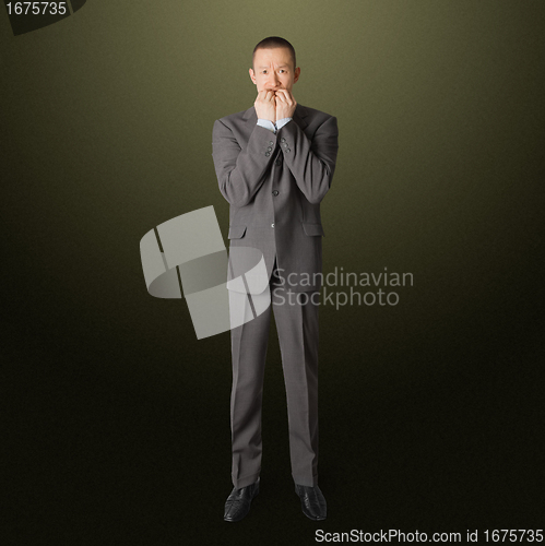 Image of scared businessman