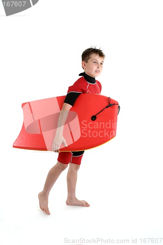 Image of Surfer boy holding a bodyboard