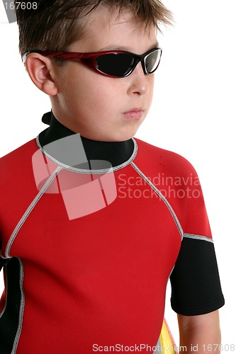 Image of Boy in wetsuit and sunglasses