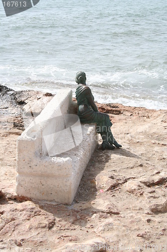 Image of Woman on sofa