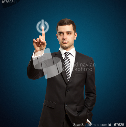 Image of businessman push the button