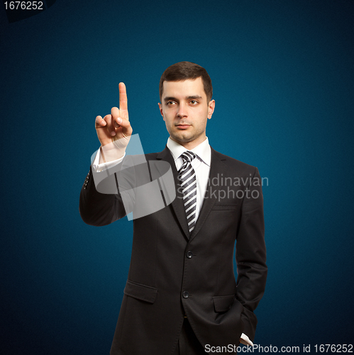 Image of businessman push the button