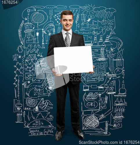 Image of businessman with empty write board