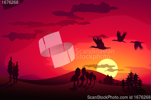 Image of Sunset landscape and flying storks