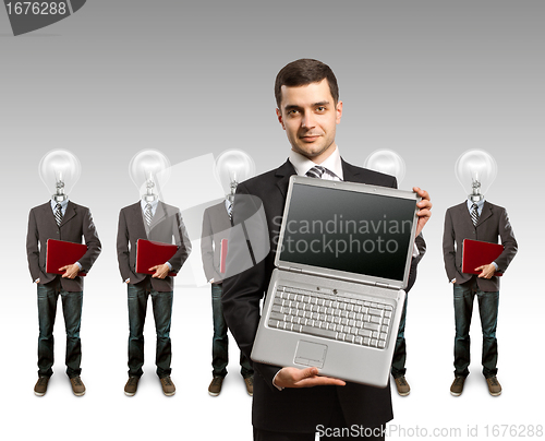 Image of lamp head businesspeople with laptop